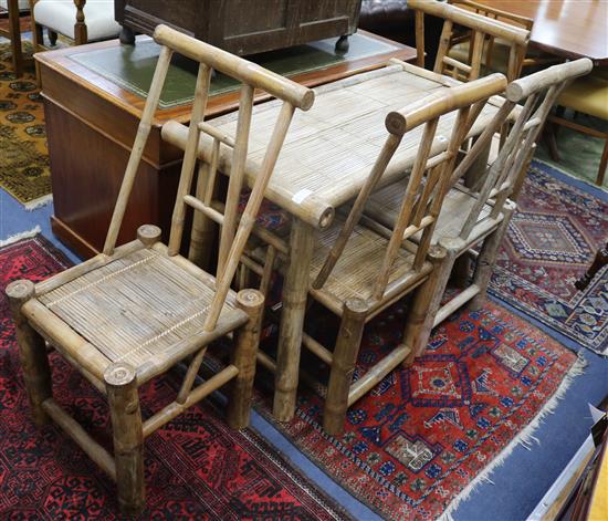 4 bamboo chairs and table W.110cm.